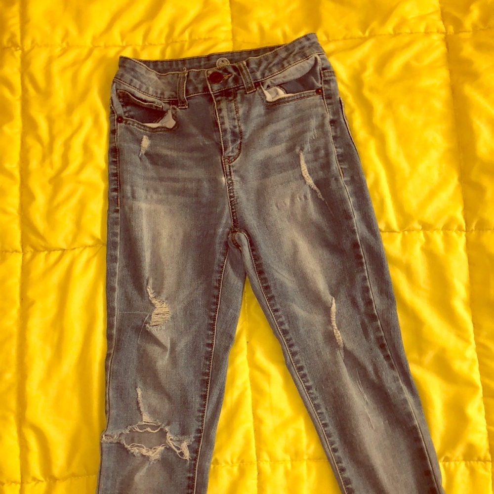 Light blue ripped jeans